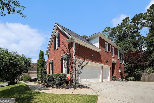 351 Prestbury Ct, Suwanee, GA 30024 - view of home's exterior with brick siding and concrete driveway