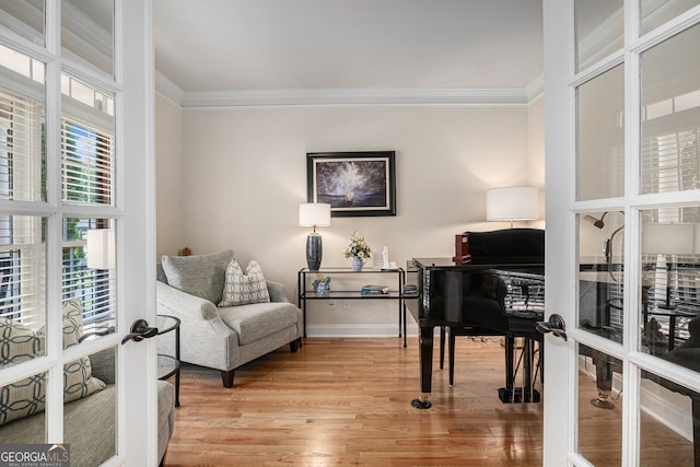 351 Prestbury Ct, Suwanee, GA 30024 - sitting room featuring french doors, crown molding, a desk, and light wood-type flooring