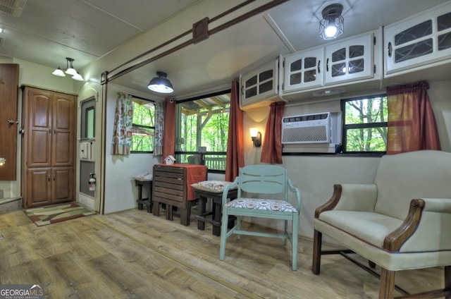 236 31st St Unit C638, Ellijay, GA 30540 - sitting room featuring wood finished floors and cooling unit