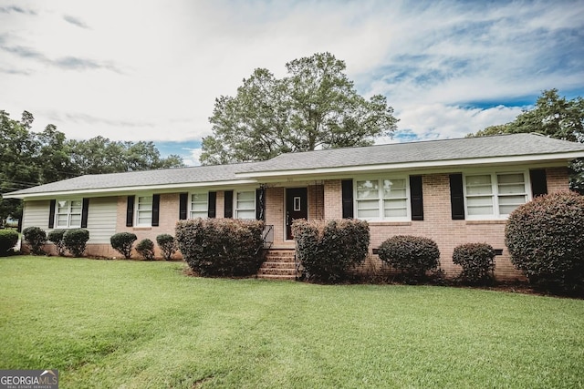 500 Holmes St, Barnesville, GA 30204 - ranch-style house featuring brick siding and a front lawn