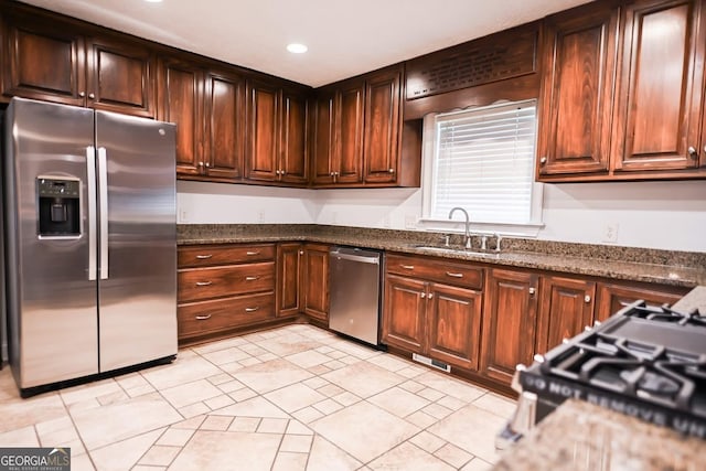 500 Holmes St, Barnesville, GA 30204 - kitchen featuring appliances with stainless steel finishes, recessed lighting, and dark stone counters