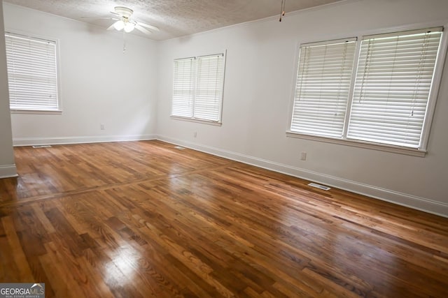 500 Holmes St, Barnesville, GA 30204 - unfurnished room with a ceiling fan, a textured ceiling, and wood finished floors