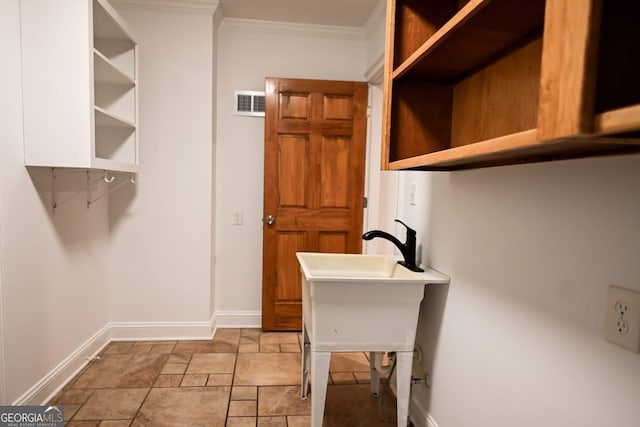 500 Holmes St, Barnesville, GA 30204 - washroom featuring crown molding and baseboards