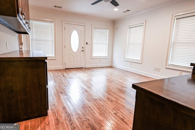 500 Holmes St, Barnesville, GA 30204 - entryway featuring a ceiling fan, ornamental molding, light wood-style flooring, and recessed lighting