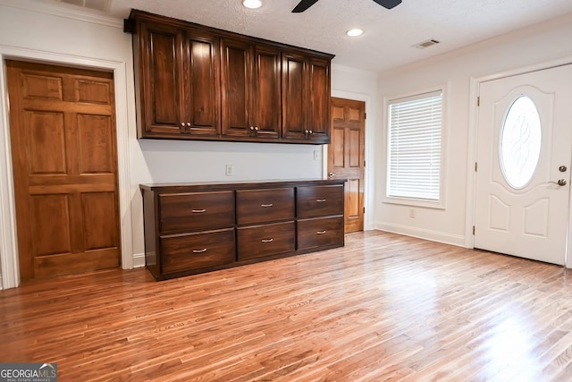 500 Holmes St, Barnesville, GA 30204 - entryway with light wood-style floors, a ceiling fan, ornamental molding, and recessed lighting