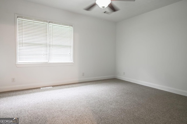 500 Holmes St, Barnesville, GA 30204 - carpeted spare room with ceiling fan and plenty of natural light