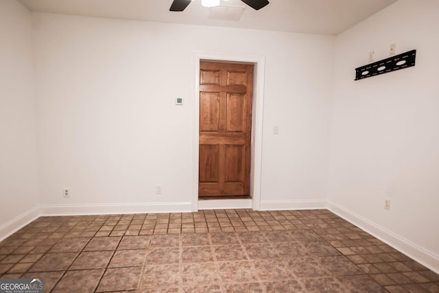 500 Holmes St, Barnesville, GA 30204 - spare room featuring a ceiling fan and baseboards