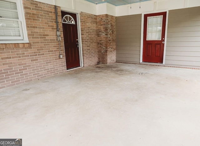 500 Holmes St, Barnesville, GA 30204 - view of exterior entry featuring brick siding