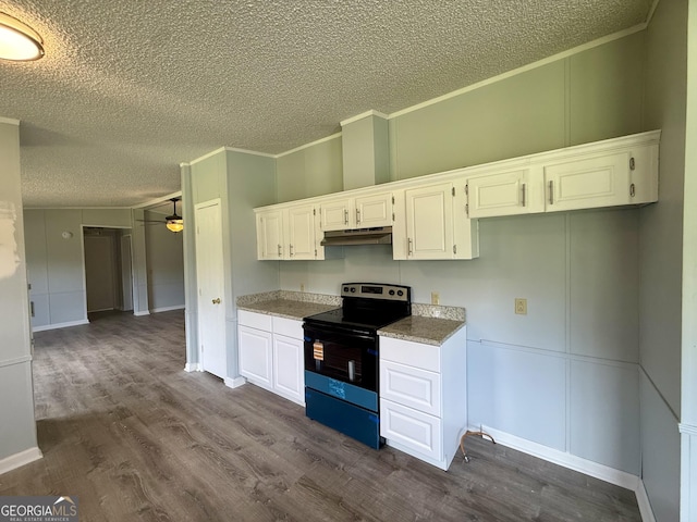 314 Elbert Jackson Rd, Forsyth, GA 31029 - kitchen featuring black range with electric stovetop, under cabinet range hood, a textured ceiling, dark wood-style floors, and white cabinets