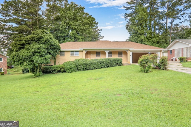 3563 Carriage Way, East Point, GA 30344 - ranch-style house with a garage, a front lawn, and concrete driveway