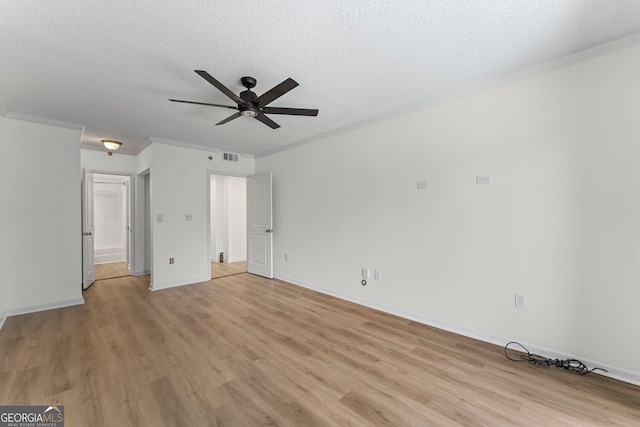 1280 W Peachtree St NW Unit 808, Atlanta, GA 30309 - unfurnished living room with light wood-style floors, crown molding, ceiling fan, and a textured ceiling