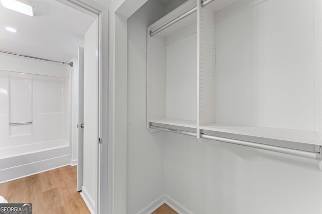 1280 W Peachtree St NW Unit 808, Atlanta, GA 30309 - walk in closet with light wood finished floors