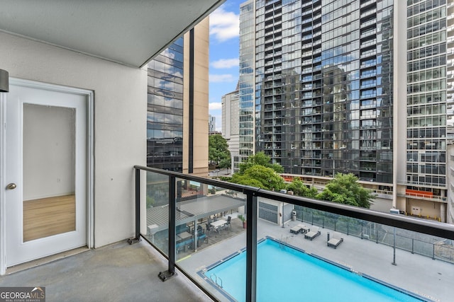 1280 W Peachtree St NW Unit 808, Atlanta, GA 30309 - balcony with a city view and view of pool
