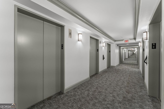 1280 W Peachtree St NW Unit 808, Atlanta, GA 30309 - corridor with elevator, carpet, and a raised ceiling