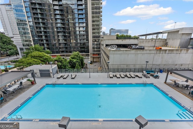 1280 W Peachtree St NW Unit 808, Atlanta, GA 30309 - community pool with a patio area