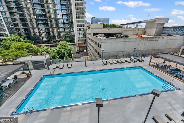 1280 W Peachtree St NW Unit 808, Atlanta, GA 30309 - community pool featuring a patio area