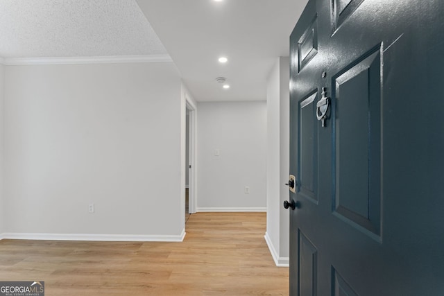 1280 W Peachtree St NW Unit 808, Atlanta, GA 30309 - foyer entrance with recessed lighting, light wood-style flooring, and crown molding