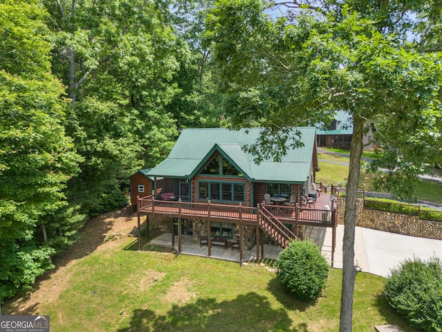 115 Wildcat Run, Suches, GA 30572 - rear view of property featuring a deck, a yard, a metal roof, stairs, and log exterior