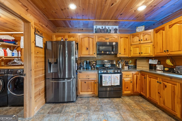 115 Wildcat Run, Suches, GA 30572 - kitchen with stainless steel appliances, separate washer and dryer, wooden ceiling, recessed lighting, and dark stone finish flooring