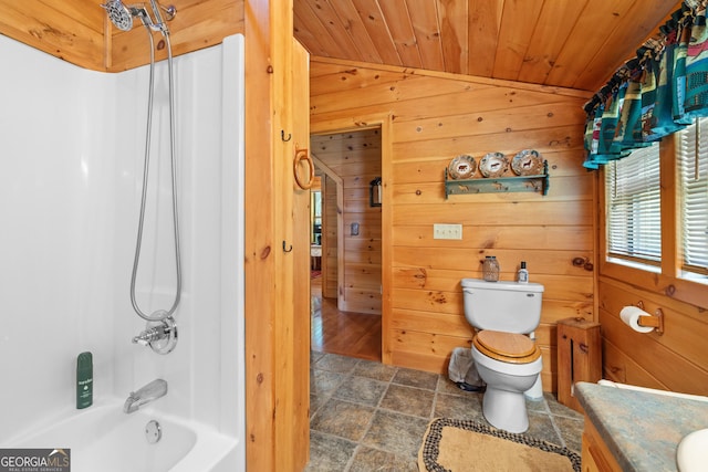 115 Wildcat Run, Suches, GA 30572 - bathroom featuring wooden walls, stone finish floors, vanity, wood ceiling, and shower / tub combination