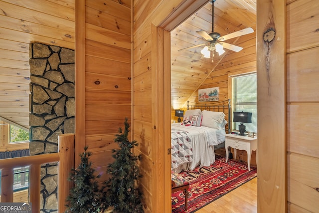 115 Wildcat Run, Suches, GA 30572 - bedroom featuring vaulted ceiling, wood finished floors, wood walls, and wood ceiling
