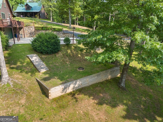 115 Wildcat Run, Suches, GA 30572 - view of green lawn with a deck and a patio area