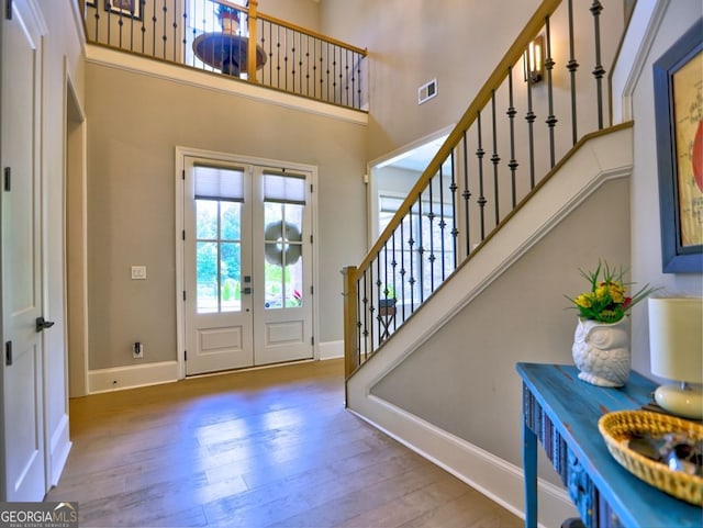 913 Sunny Meadows Ln, Marietta, GA 30062 - foyer with hardwood / wood-style floors, a high ceiling, stairs, and french doors
