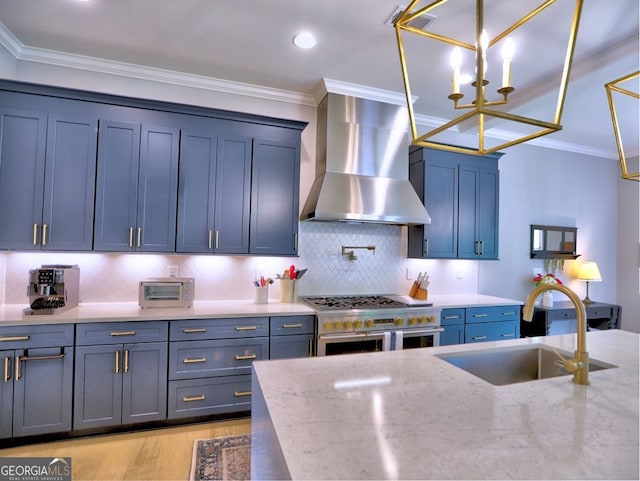 913 Sunny Meadows Ln, Marietta, GA 30062 - kitchen with wall chimney exhaust hood, double oven range, light wood-type flooring, a chandelier, and light stone countertops