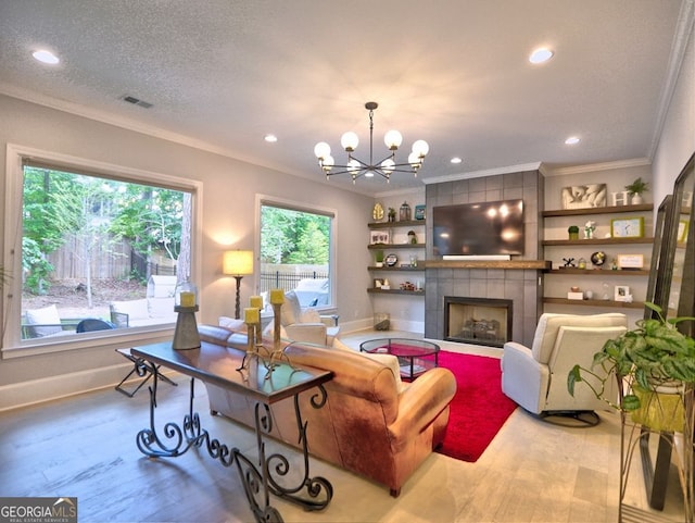 913 Sunny Meadows Ln, Marietta, GA 30062 - living room with crown molding, a fireplace, wood finished floors, a chandelier, and recessed lighting