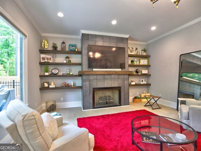 913 Sunny Meadows Ln, Marietta, GA 30062 - living area featuring a tile fireplace, wood finished floors, ornamental molding, and recessed lighting