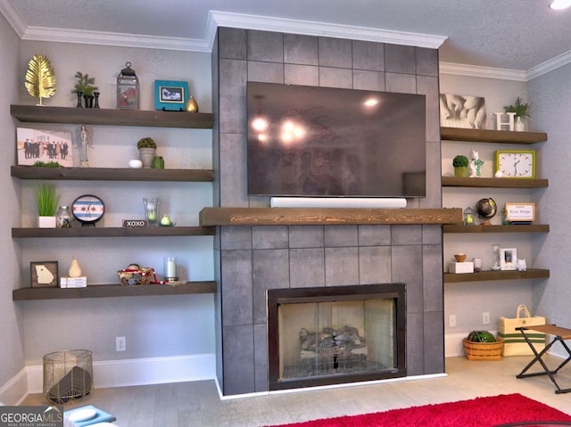 913 Sunny Meadows Ln, Marietta, GA 30062 - living area featuring a tiled fireplace, crown molding, and wood finished floors
