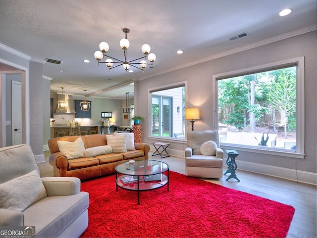 913 Sunny Meadows Ln, Marietta, GA 30062 - living area with crown molding, a chandelier, wood finished floors, and recessed lighting