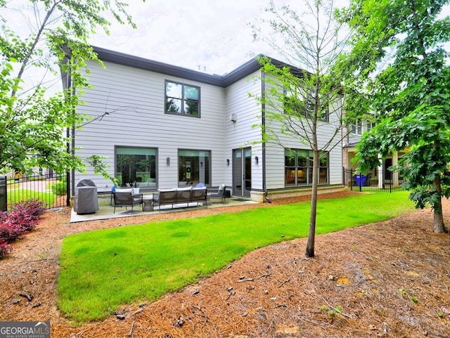 913 Sunny Meadows Ln, Marietta, GA 30062 - back of house with an outdoor living space and a patio area
