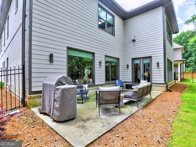 913 Sunny Meadows Ln, Marietta, GA 30062 - rear view of house featuring an outdoor living space and a patio