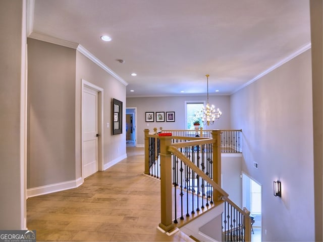 913 Sunny Meadows Ln, Marietta, GA 30062 - hallway featuring an upstairs landing, light wood-type flooring, recessed lighting, a chandelier, and crown molding