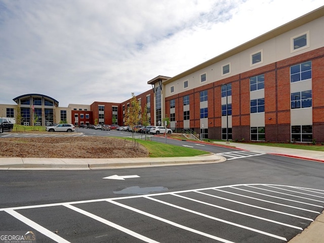 913 Sunny Meadows Ln, Marietta, GA 30062 - view of building exterior with uncovered parking