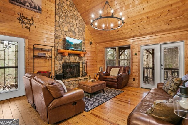 230 Grove Ln Unit 3642, Ellijay, GA 30540 - living area featuring wood ceiling, wood-type flooring, a chandelier, high vaulted ceiling, and a stone fireplace