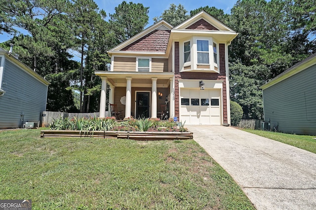 1313 Old Countryside Cir, Stone Mountain, GA 30083 - victorian house featuring an attached garage, driveway, and a porch