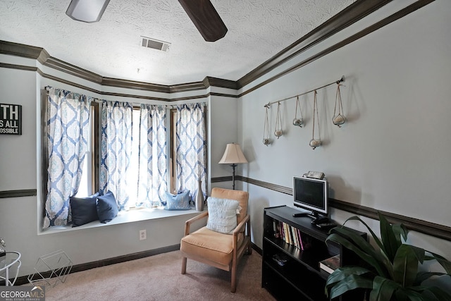 1313 Old Countryside Cir, Stone Mountain, GA 30083 - living area with crown molding, a textured ceiling, ceiling fan, and carpet flooring