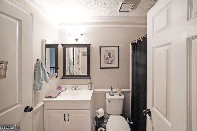 1313 Old Countryside Cir, Stone Mountain, GA 30083 - bathroom with vanity, a textured ceiling, and ornamental molding
