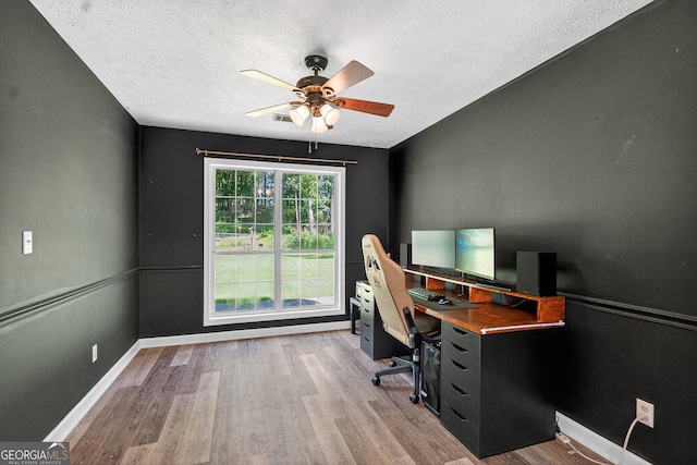 106 Ivy Ct, Lagrange, GA 30241 - home office with ceiling fan, wood finished floors, and a textured ceiling