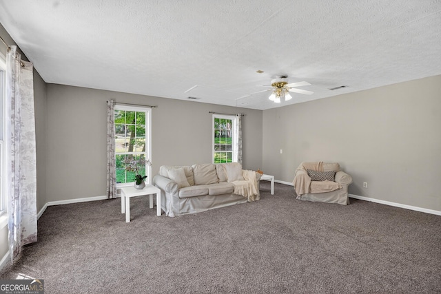 106 Ivy Ct, Lagrange, GA 30241 - living room with ceiling fan, a textured ceiling, attic access, and carpet floors
