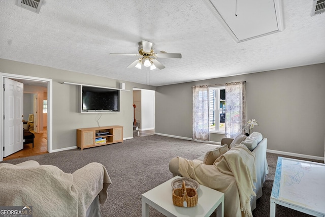 106 Ivy Ct, Lagrange, GA 30241 - living room featuring attic access, a ceiling fan, a textured ceiling, and carpet floors
