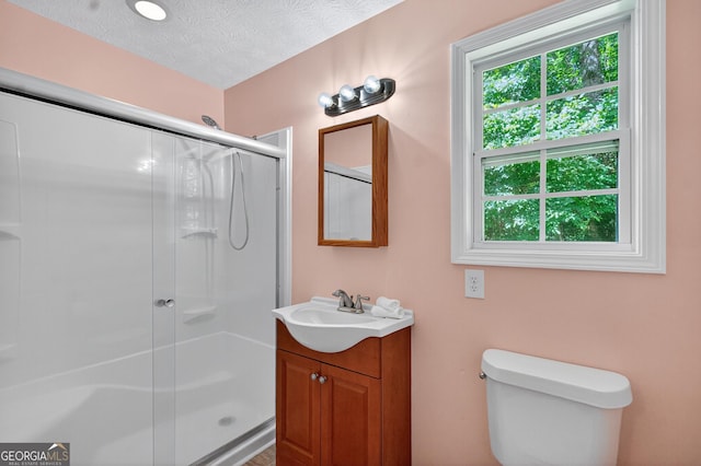 106 Ivy Ct, Lagrange, GA 30241 - full bathroom with vanity, a shower with door, and a textured ceiling