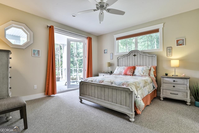 682 Tanglewood Ln, Ellijay, GA 30540 - carpeted bedroom with access to exterior, multiple windows, and a ceiling fan