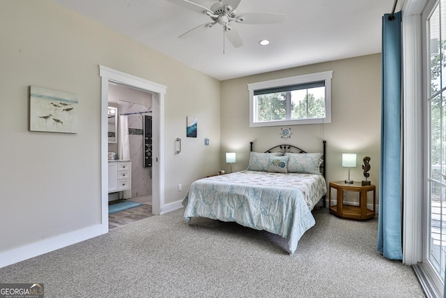 682 Tanglewood Ln, Ellijay, GA 30540 - bedroom featuring carpet flooring, multiple windows, a ceiling fan, and ensuite bathroom