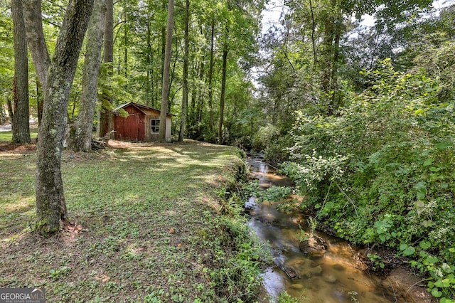 682 Tanglewood Ln, Ellijay, GA 30540 - view of yard with an outbuilding and a wooded view