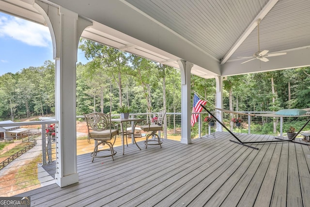682 Tanglewood Ln, Ellijay, GA 30540 - wooden deck featuring a ceiling fan and view of scattered trees
