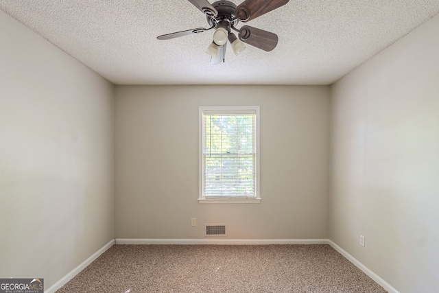 3110 Ashly Cove Ln, Snellville, GA 30078 - spare room with carpet flooring, a textured ceiling, and a ceiling fan