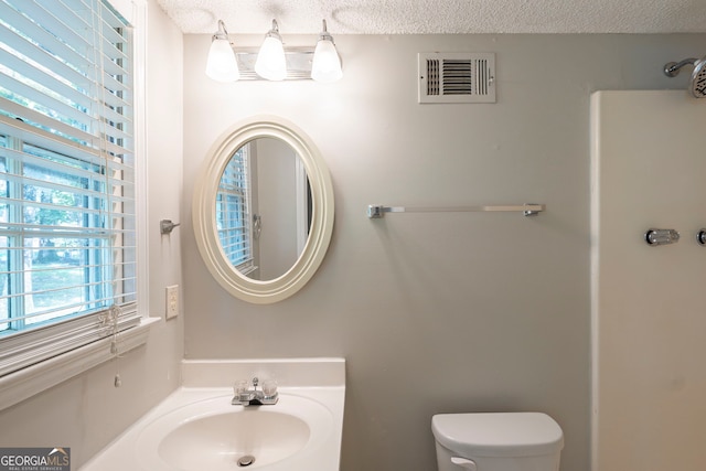 3110 Ashly Cove Ln, Snellville, GA 30078 - bathroom with a sink and a textured ceiling